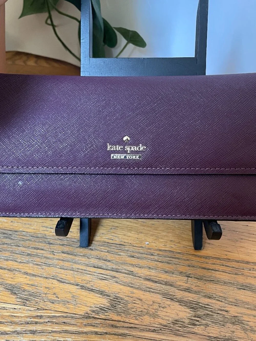 Kate Spade Large bi- Fold wallet in Deep Plum